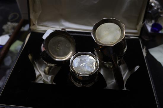 A cased George V silver three piece cafe au lait set, Birmingham 1930,